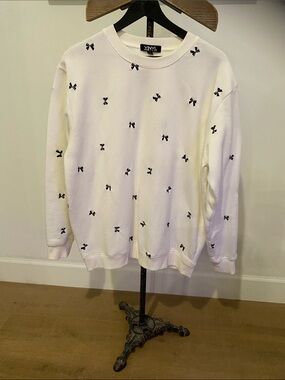 White Crewneck Sweatshirt with Black Bow Motif